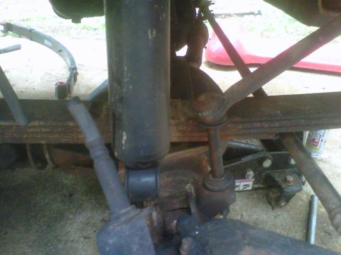 1981 Toyota Hilux - Vehicle suspension parts including a shock absorber and leaf spring are shown in detail.