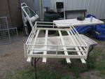 1991 Ford Bronco - A roof rack is shown outdoors, possibly for a vehicle, with other items in the background.