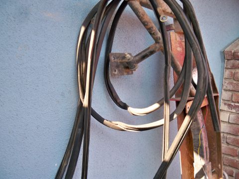 1985 Ford Bronco - Rubber seals are stored on a wall, possibly for a vehicle restoration project.
