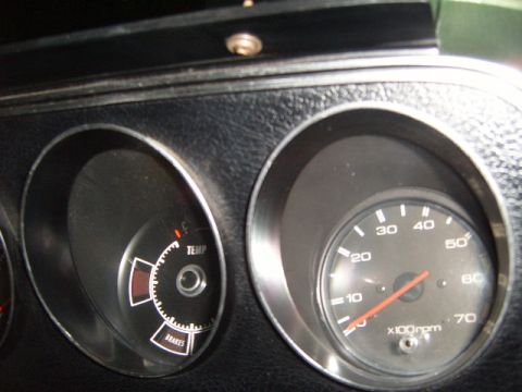 1973 Ford Ranchero - The dashboard shows a temperature gauge and a tachometer, with 'TEMP' and 'BRAKES' labels visible.