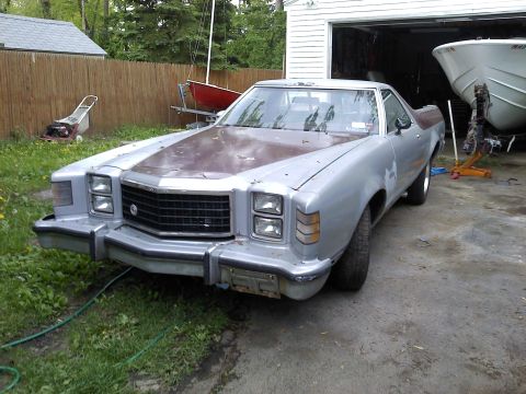 1979 Ford Ranchero - This 1979 Ford Ranchero is parked in a driveway next to a garage and a boat.