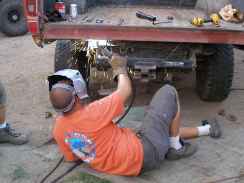 1969 Ford F-250 - Welding repairs being done on the frame of a 1969 Ford F-250 pickup truck.