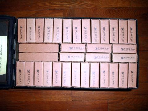 1995 Mercury Grand Marquis - A case filled with ammunition boxes, each labeled FEDERAL AMMUNITION.