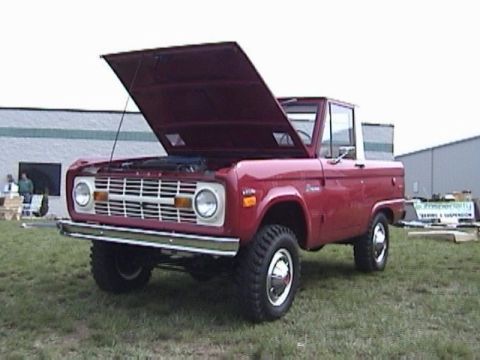 1995 Ford Bronco - This classic Ford Bronco is displayed with its hood open, revealing the engine bay.