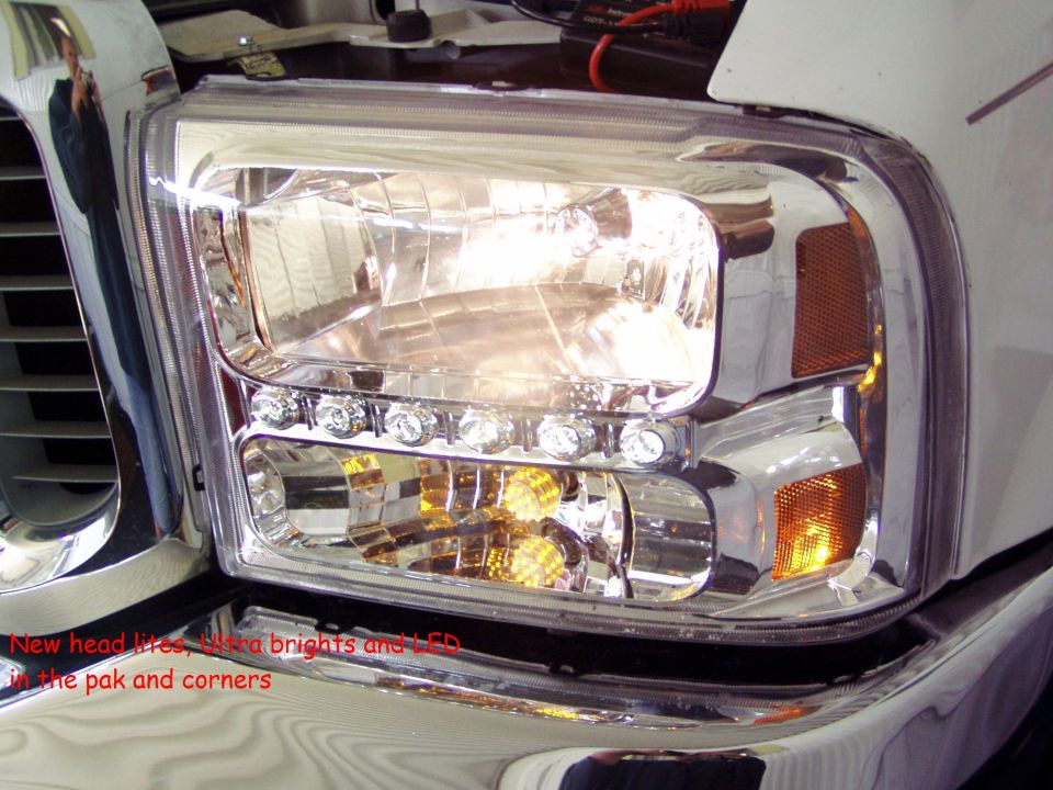 Close-up of a truck's front headlight with new LED lights installed