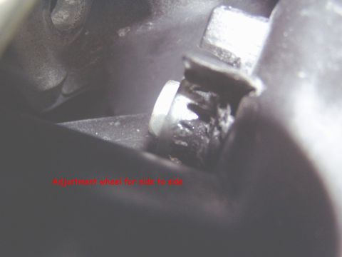2001 Ford Excursion - Detail of an interior adjustment wheel, likely for seat or mirror positioning.