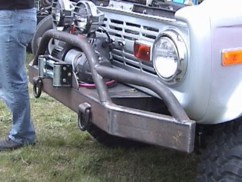 1995 Ford Bronco - This Ford Bronco features a heavy-duty custom bumper with a winch and auxiliary lights.