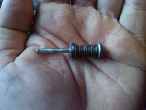 1986 Ford Bronco - Cleaned up with some new o-rings. Now it slides up and down the needle shaft without any problems.