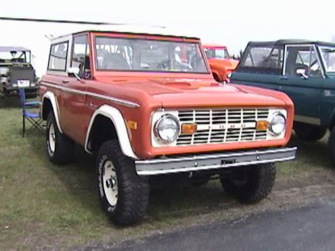 1995 Ford Bronco - This classic Ford Bronco features a distinctive grille and two-tone paint scheme.