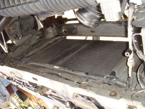 1992 Ford Bronco - Underside view of radiator and associated engine parts.