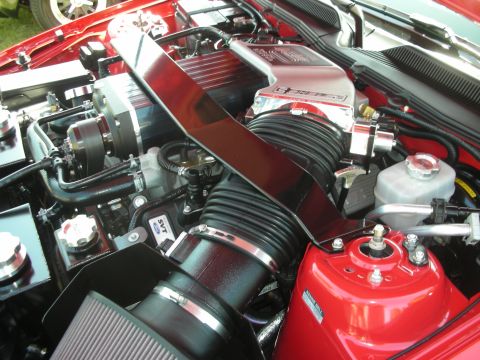 1992 Ford Crown Victoria - The engine bay features a supercharger and an SVT badge, indicating performance modifications.