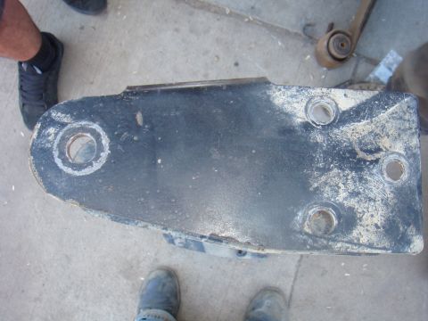 1992 Ford Bronco - Close-up of a black axle bracket, likely for an off-road vehicle build.