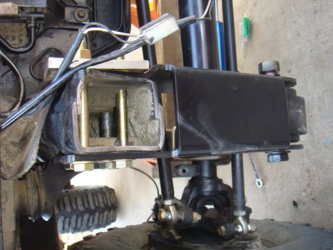 1992 Ford Bronco - This image shows a close-up view of a vehicle's suspension component, focusing on its mechanical details.