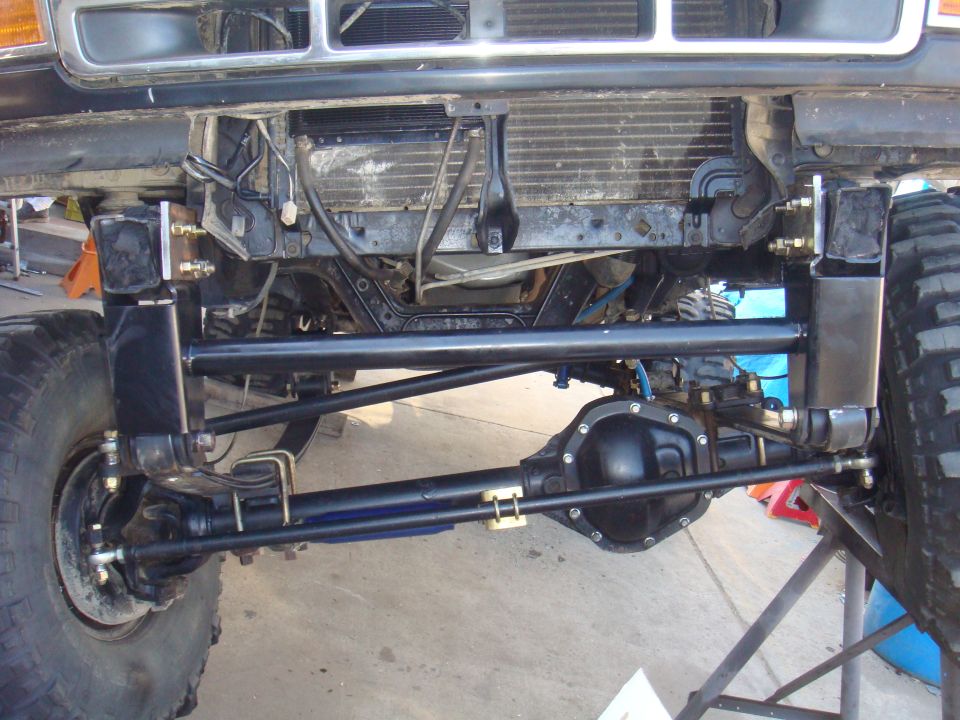 1992 Ford Bronco front axle with upgraded suspension components and large tires