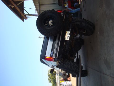 1992 Ford Bronco - This 1992 Ford Bronco is equipped with large off-road tires and a spare tire mounted on the rear.