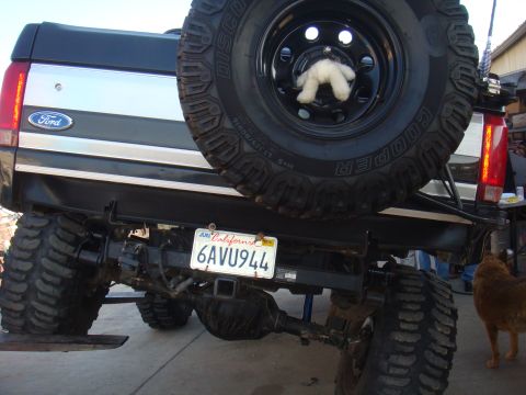1992 Ford Bronco - This 1992 Ford Bronco features a lifted suspension and a spare tire mounted on the rear tailgate.