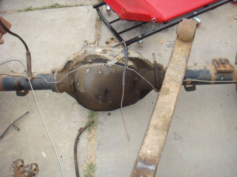 1992 Ford Bronco - Rear axle assembly, likely from a truck or SUV, shown on a concrete surface.