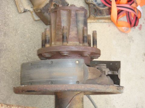 1992 Ford Bronco - This is a close-up of a vehicle's axle hub, showing its lug bolts and brake drum assembly.