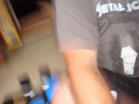 1992 Ford Bronco - A person wearing a t-shirt with a band logo is visible in the foreground, with a watermark at the bottom.