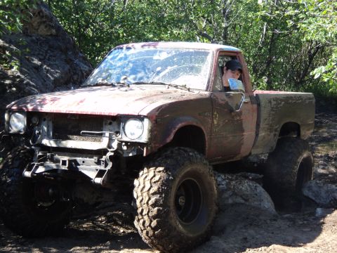 1990 Chevrolet Suburban - This heavily modified pickup truck appears to be from the early 1980s, not a 1990 Chevrolet Suburban.