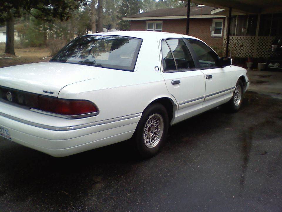 1993 Mercury Grand Marquis, rear quarter view, parked in driveway