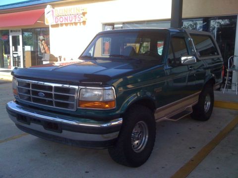 1996 Ford Bronco - 1996 Ford Bronco parked outside a Dunkin' Donuts.