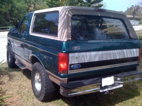 1996 Ford Bronco - This 1996 Ford Bronco is shown from the rear, with its removable top and chrome bumper.