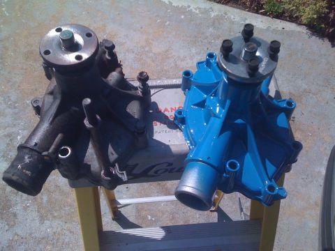 1996 Ford Bronco - Comparison of an old water pump next to a newly painted one.