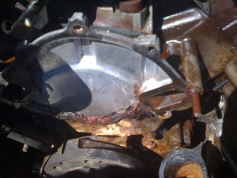 1996 Ford Bronco - This engine part shows significant rust and corrosion, indicating a need for replacement or repair.