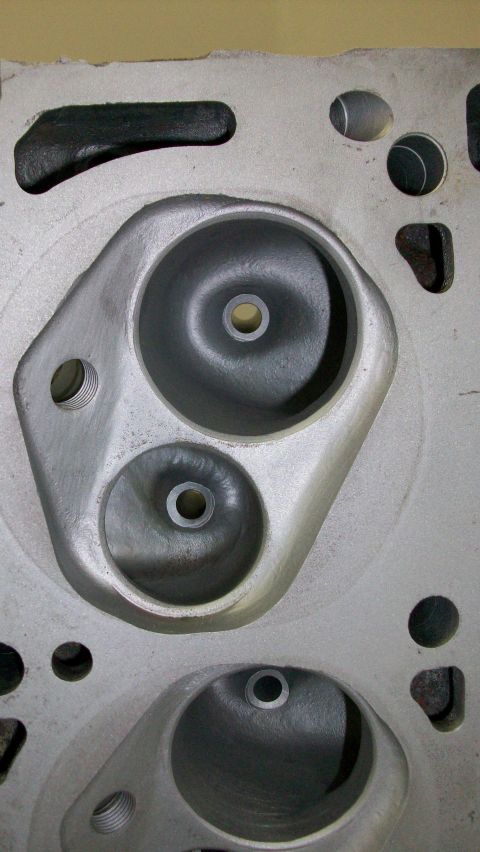 1973 Ford Ranchero - Engine cylinder head showing intake ports and bolt holes.