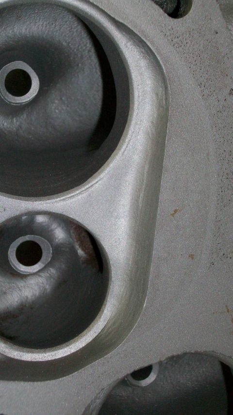 1973 Ford Ranchero - Engine cylinder head with intake and exhaust ports visible.