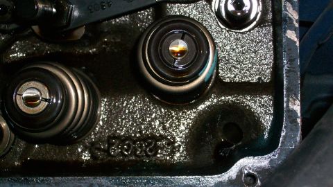 1973 Ford Ranchero - Engine cylinder head detail with valves and springs visible, casting numbers present.