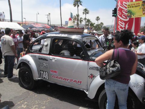 1986 Ford Bronco - A Volkswagen Beetle, modified for racing and adorned with a sombrero, is seen at an event.