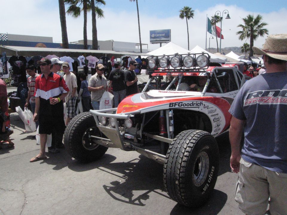 Off-road buggy with BFGoodrich tires and multiple lights on roof rack