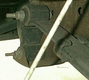 1990 Ford Bronco - This is what a stock setup will look like. This shackle is said to be "in tension"