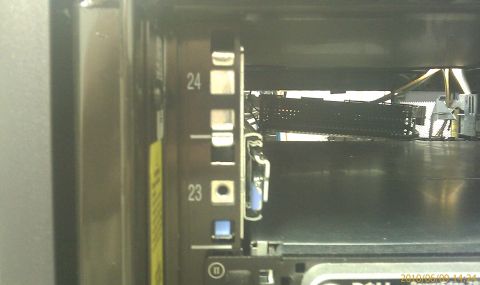 1985 Ford F-150 - A server rack interior is visible, with numbered slots and electronic components.