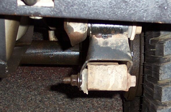 The stock shackles really aren't up to the task.  My passenger side bent (altho you can see my spring bushing was hurting, too)