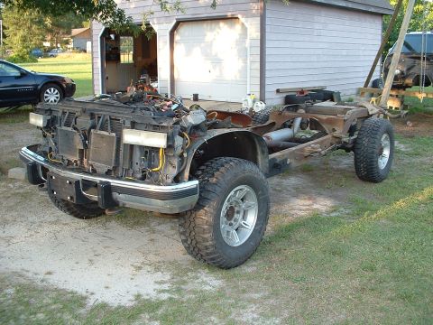 1994 GMC Suburban - This truck chassis, likely from the mid-1990s, is missing its body panels and engine components.