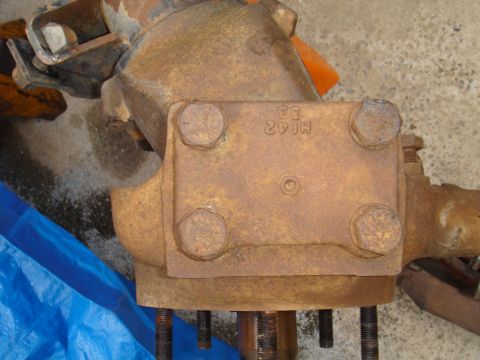 1992 Ford Bronco - Close-up of a rusty axle housing showing stamped numbers 'HI 42 33'.