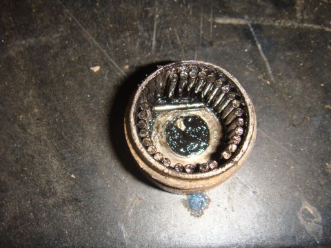 1992 Ford Bronco - A close-up view of a differential pinion gear assembly, showing its internal components and lubrication.