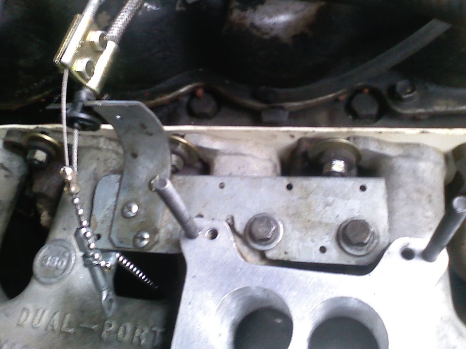 In the midst of a project so thought I'd snap some pictures of my custom accelerator bracket.  The gold clip is for an aftermarket cruise control I added.