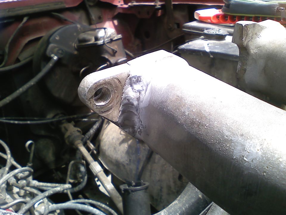 Installed a Clifford Performance gasket and it almost immediately split (piece of junk).  Caused the tab to fold in and break off.  Had to have a local shop weld it back up.