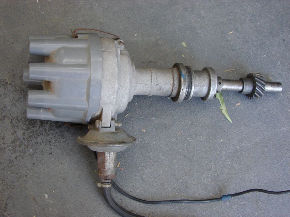 automotive distributor with cap and gear