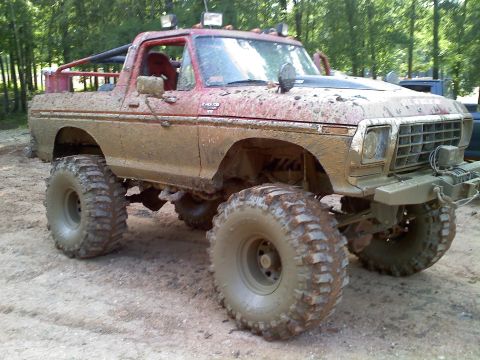 1979 Ford Bronco - This heavily modified 1978 Ford Bronco is caked in mud, ready for off-road adventure.