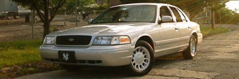 2000 Ford Crown Victoria - This 2000 Ford Crown Victoria is shown from a front 3/4 angle, a New York Yankees license plate.