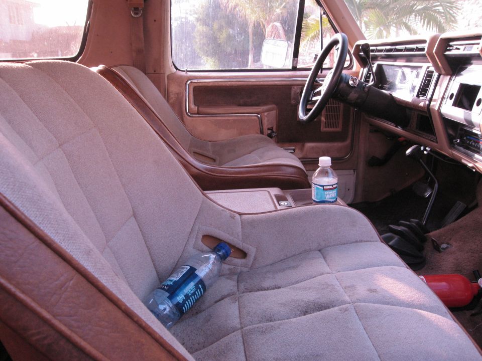 1986 Ford Bronco interior with bucket seats and center console