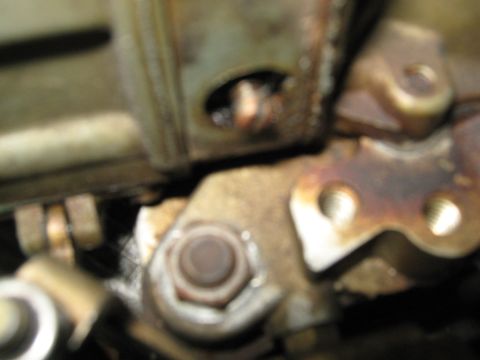 1985 Ford Mustang - Engine part detail with bolts and mounting hardware visible.