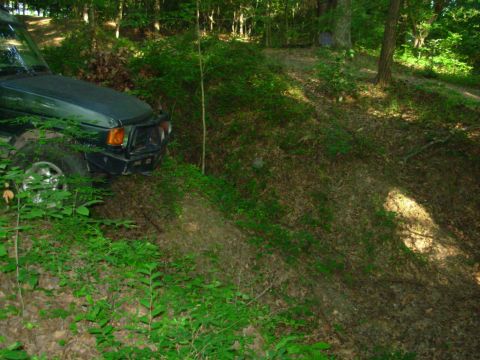 1983 Ford Bronco - Greg blazed this trail last time, but I had to winch him out, so he wanted to give it another shot. The patch of sunlight is about 6 feet b…