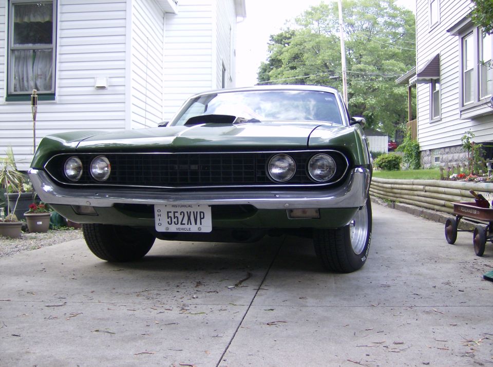 Green 1970 Ford Ranchero front view with scoop on hood