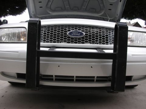 2004 Ford Crown Victoria - This Ford Crown Victoria features a heavy-duty push bumper mounted over the front grille.